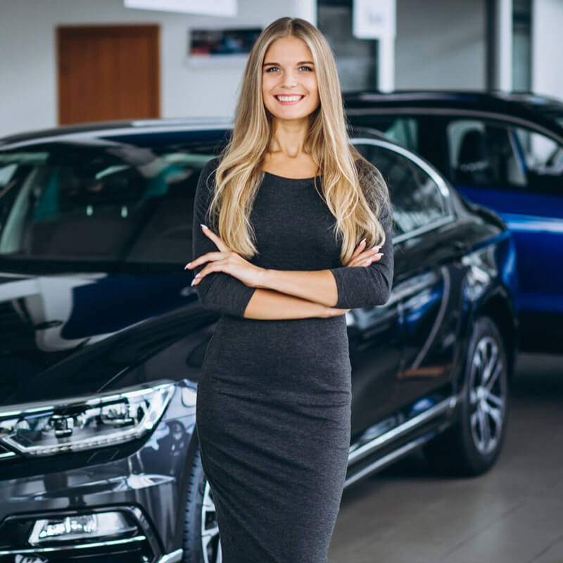 Professional woman with luxury cars